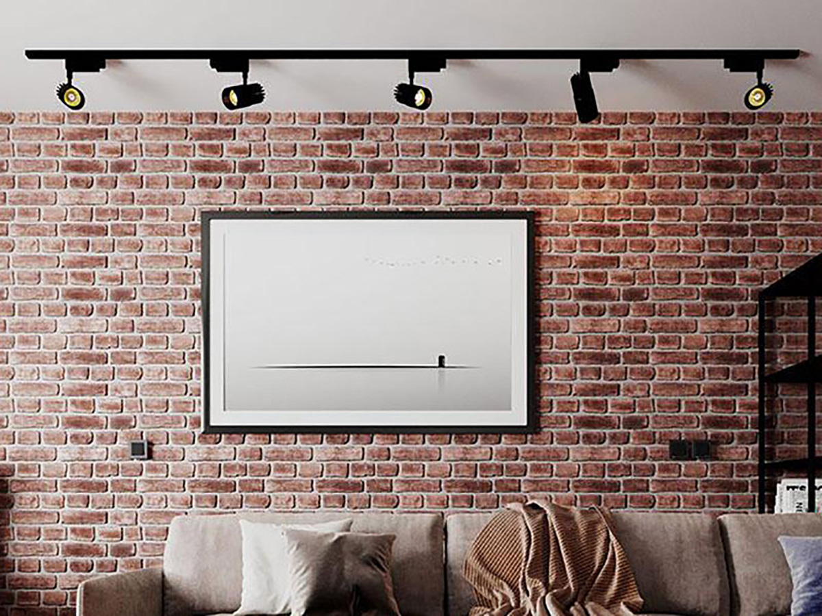 Червона цегла Лофт у просторій кімнаті